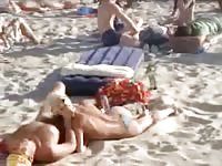 Mature slut does what all good girls should do at the beach and sucks her man's cock
