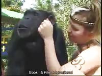 Tattooed warrior enjoys masturbating her clitoris in front of her gorilla