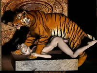 Blondie is on her knees waiting for the tiger to fuck her wet pussy