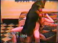 Dark-haired teenage likes getting wildly fucked by her dog in the living room