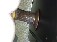 Man rides a dildo that is covered in poop