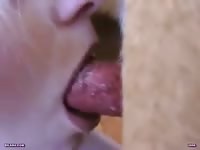 Girl enjoys sucking on dog penis bestiality