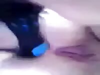 Horny girl masturbates with hairbrush
