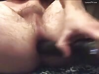 Fag fucks hole with flashlight 