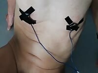 Feeling the 100V electricity attached to the nipple.